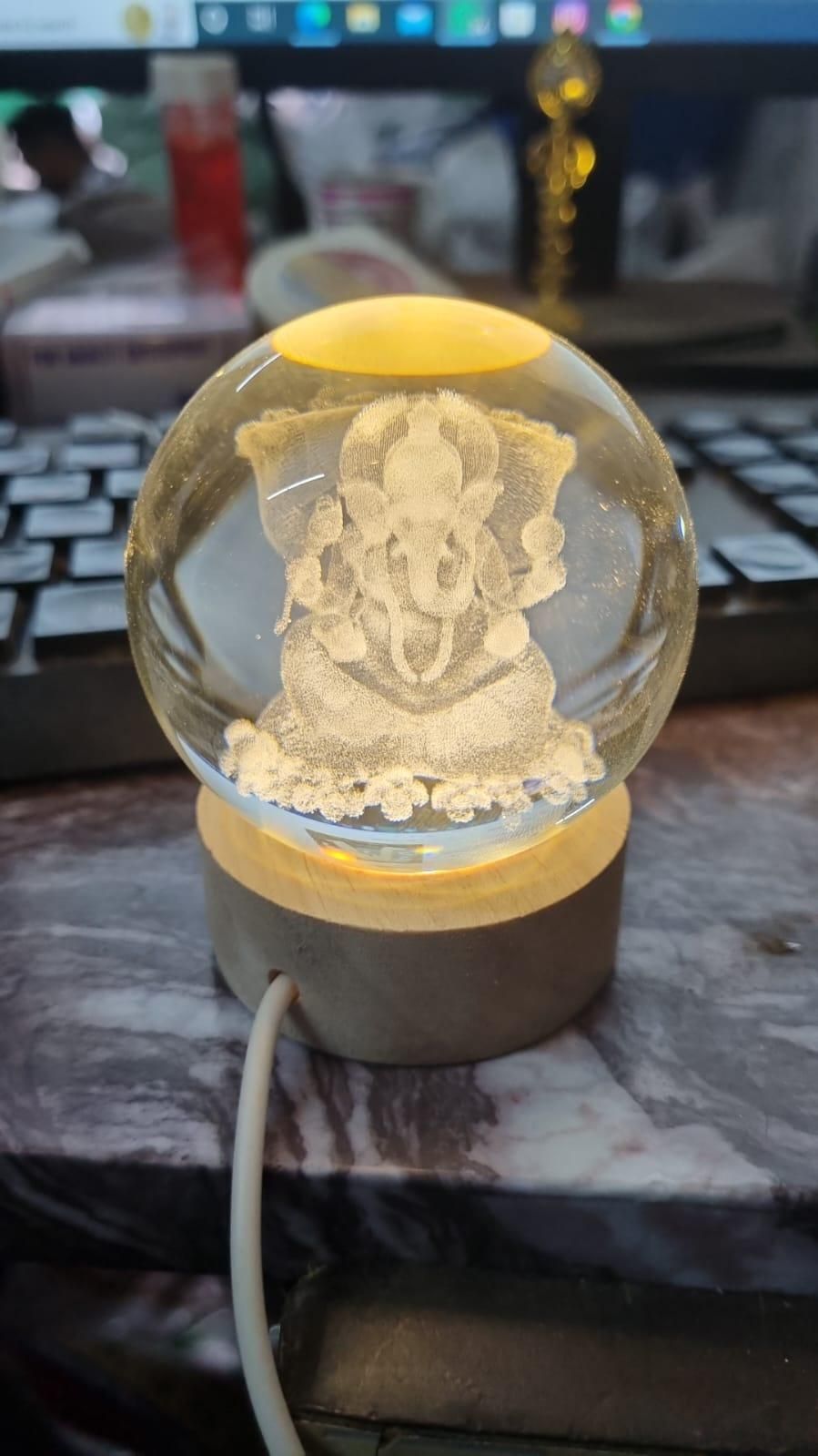 Ganesh Crystal LED Lamp by 1h8x0d-zb, featuring a beautifully carved Ganesh design illuminated by soft LED light.