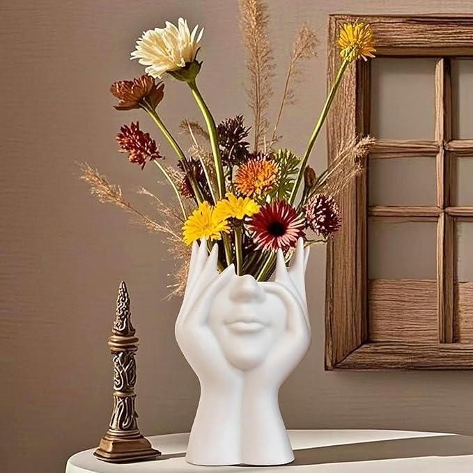 Aesthetic face vase by 1h8x0d-zb with a unique design, showcasing a minimalist face shape and smooth finish.
