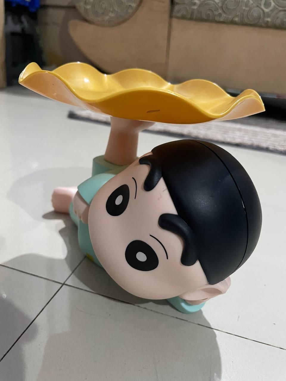 Shinchan tray holder by 1h8x0d-zb featuring a playful design with Shinchan character, perfect for organizing small items.