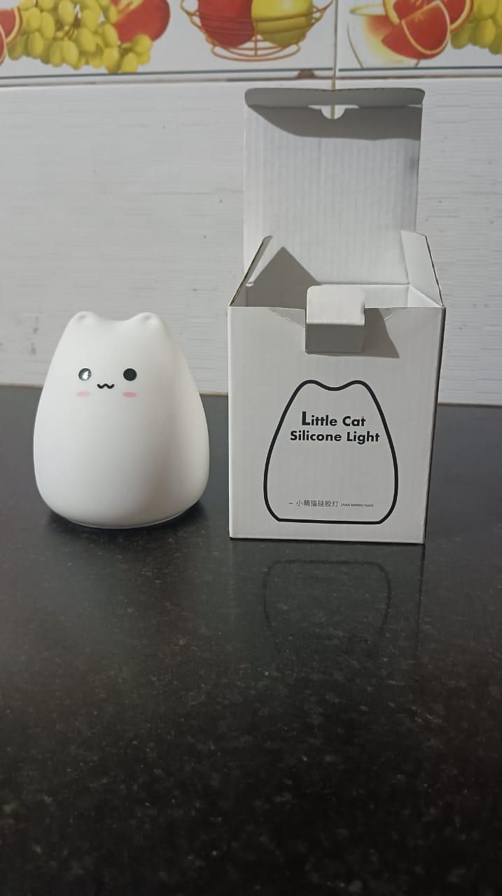 Little Cat Silicone Light by 1h8x0d-zb, featuring a cute cat design with soft glow and rounded edges.