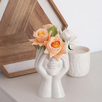 Aesthetic face vase by 1h8x0d-zb featuring a unique design with facial features and a smooth ceramic finish.