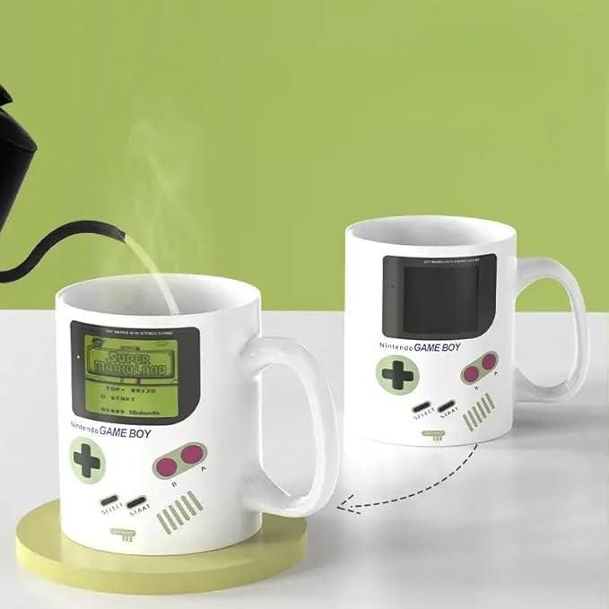 1h8x0d-zb Gameboy heat changing coffee mug displaying vibrant graphics when filled with hot liquid.