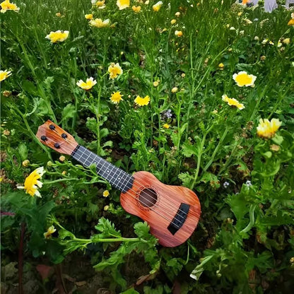 Mini wooden finish plastic guitar with 4 strings, showcasing a clear sound and detailed craftsmanship by 1h8x0d-zb.
