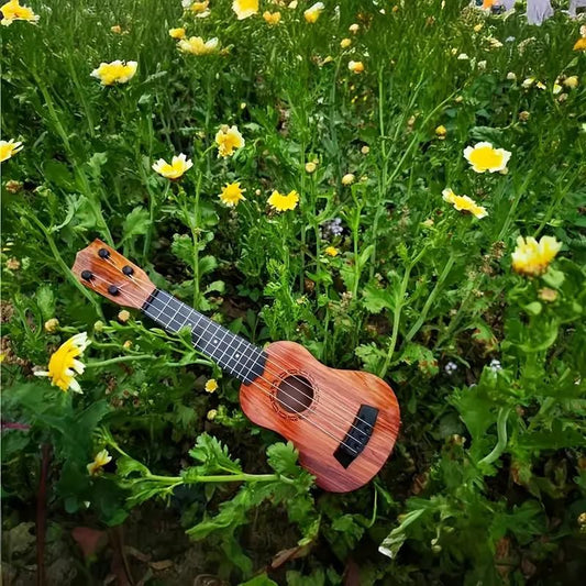 Mini wooden finish plastic guitar with 4 strings, showcasing a clear sound and detailed craftsmanship by 1h8x0d-zb.