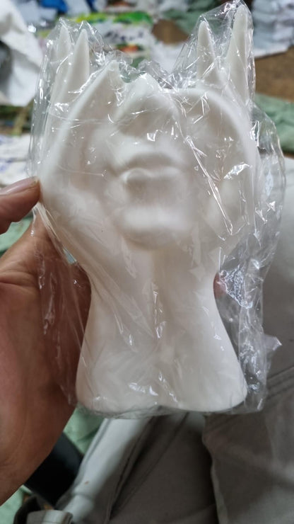 Aesthetic face vase by 1h8x0d-zb featuring a unique face design with a smooth, minimalist finish.