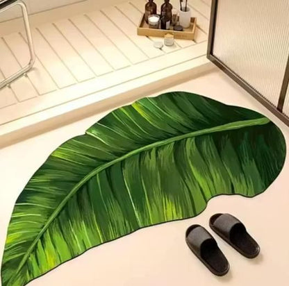 Banana leaf design bathroom mat by 1h8x0d-zb, anti-slip, measuring 45x90 cm, showcasing vibrant green leaves.