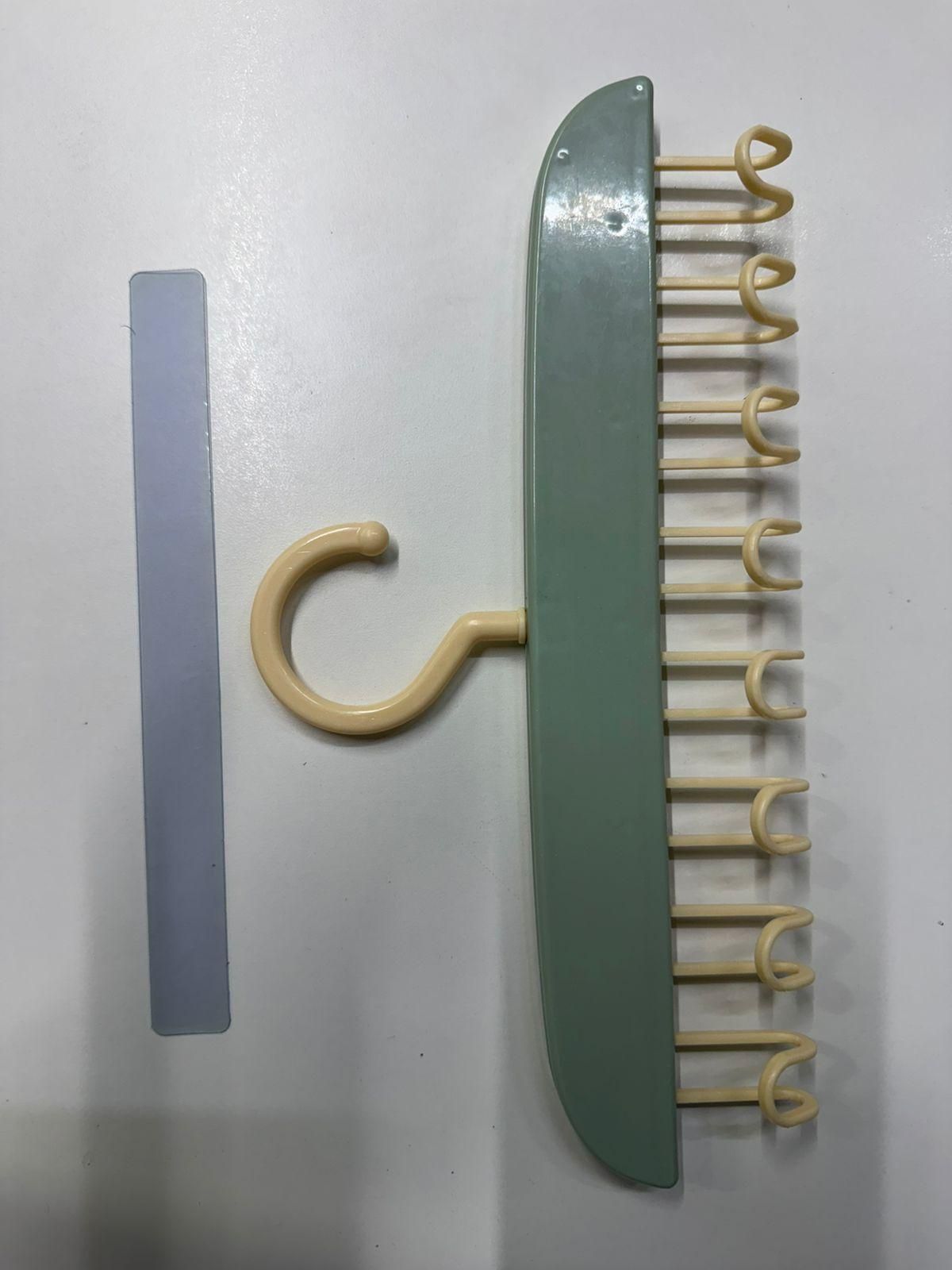 Multifunctional plastic hanger with metal hooks, pack of 2, displaying a sleek design and sturdy construction for organization.