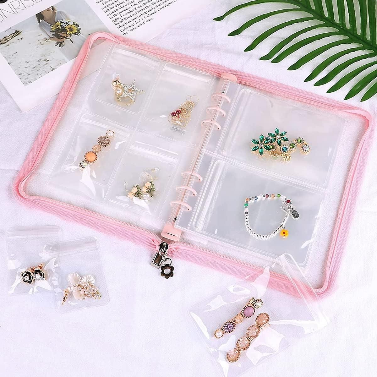 Transparent jewellery book with 60 pockets by 1h8x0d-zb, showcasing clear slots for organized accessory storage.