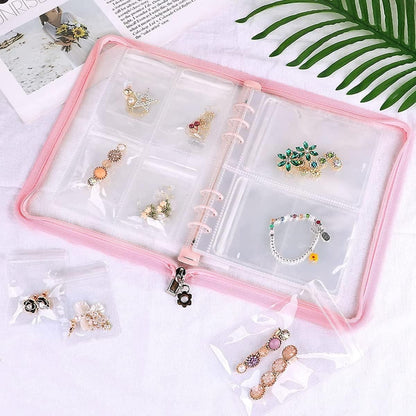 Transparent jewellery book with 60 pockets by 1h8x0d-zb, showcasing clear slots for organized accessory storage.