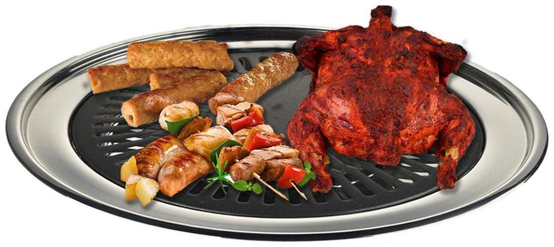 Indoor gas smokeless barbeque grill by 1h8x0d-zb showcasing a sleek design and grilling surface in a kitchen setting.