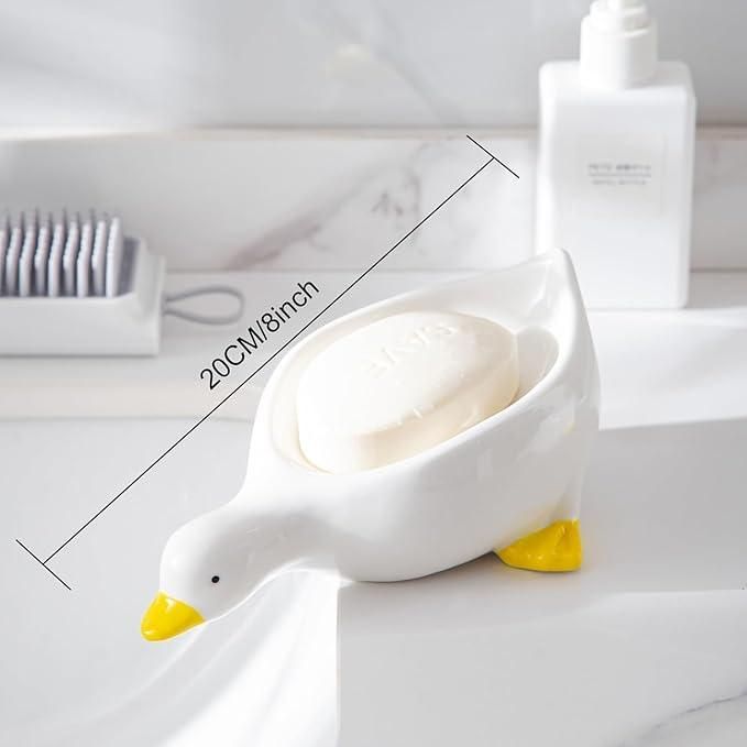 Two duck-shaped soap holders in a bright design, perfect for organizing soap in bathrooms or kitchens by 1h8x0d-zb.