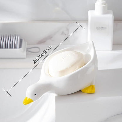 Two duck-shaped soap holders in a bright design, perfect for organizing soap in bathrooms or kitchens by 1h8x0d-zb.
