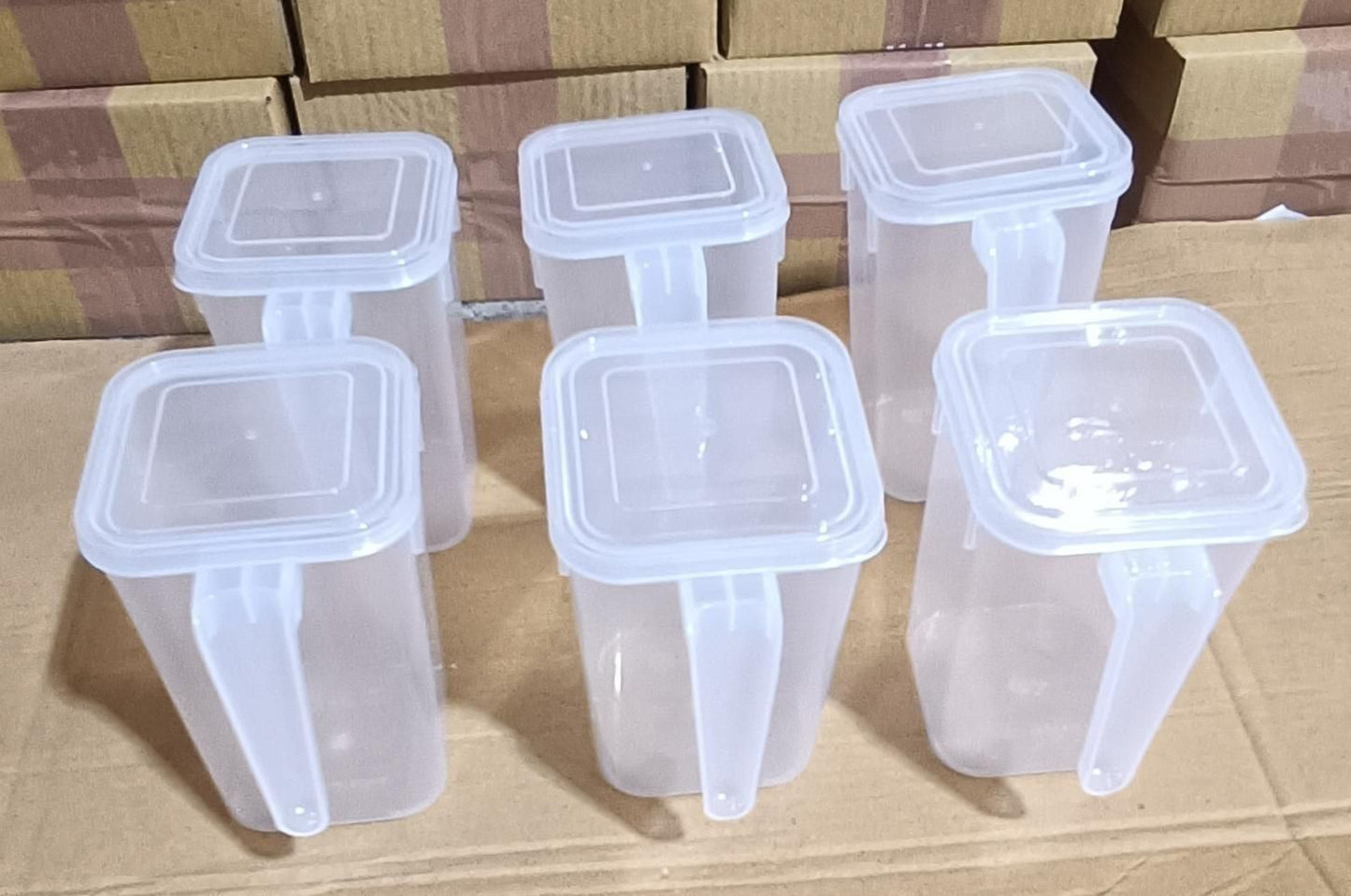Plastic multi storage box with handle and cover, featuring a durable design for organization and easy transport.