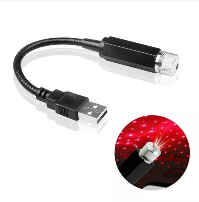 Red star lamp by 1h8x0d-zb projecting a starry sky onto a car ceiling, creating a romantic ambiance.