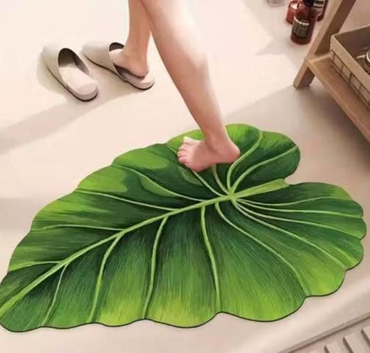 Leaf design anti-slip bathroom mat measuring 45x90 cm by 1h8x0d-zb, showcasing vibrant green leaves on a soft surface.
