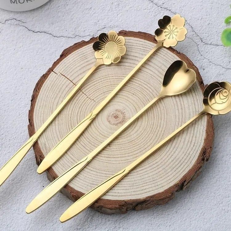 Golden finished floral spoon set of 4 featuring sunflower, rose, lily, and daisy designs by 1h8x0d-zb.