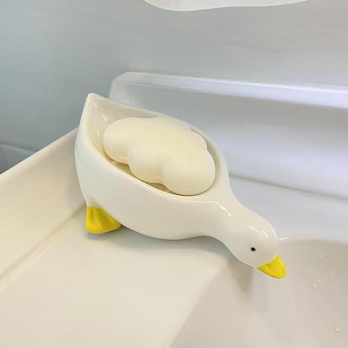 Duck shape soap holders in a pack of 2, featuring a cute design ideal for bathroom or kitchen use.